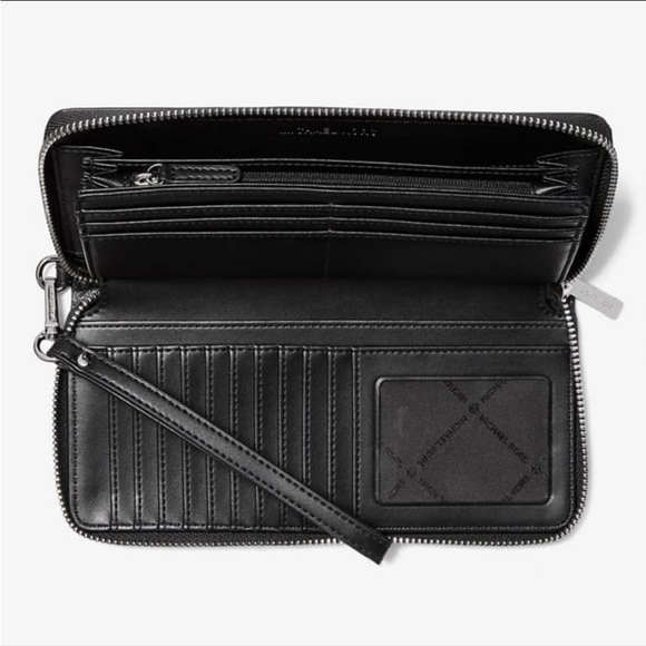 Michael Kors Jet Set Travel Large Signature
Logo and Metallic Continental Wallet - Picture 2 of 2